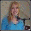 A blonde woman in a blue top appears across six showing different poses and backgrounds including a microphone, crowd, and dark backdrop
