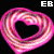 Two pink heart-shaped icons with swirling patterns, each containing a black heart cutout, displayed side-by-side against a black background with 'EB' text above.