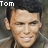 A pixelated image of a person with short dark hair wearing a light-colored jacket, displayed in two side-by-side frames showing slight facial expression differences.