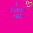 A static image with a bright pink background displays blue text reading "I LOVE SEZ" on both sides of a yellow pixelated heart symbol.