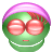 Green cartoon head with pink headband and large red eyes, showing two expressions: closed eyes with straight mouth and open mouth with small red oval mouth.
