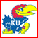 Pixelated cartoon bird mascot with red head, yellow beak, blue body, and 'KU' text on chest; adjacent pixelated text reads 'Kansas', 'is', 'great'.