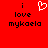 Red background with black text reading "i love mykaela" and a white pixelated heart symbol above the text.