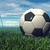 A soccer ball on grass under a blue sky with clouds, shown in three views where the rightmost view is cropped.