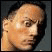 Pixelated static image of a person's face with light skin tone and short dark hair against a gray background, rendered in low-resolution 256x256 pixels.