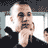 Pixelated static image of a bald man with light skin and dark eyes, wearing a white shirt against a dark background with partial gray elements.
