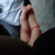 showing two hands holding, with a heart symbol and text overlay
