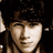 Three distinct pixelated headshots arranged in a with text labels above each, set against black backgrounds