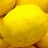A static image with a blue background split into two sections: one showing yellow lemons and the other displaying pixelated text.