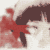 Animated sequence of a character with dark hair and red star-shaped marks on face, transitioning from side profile to front view.
