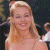 A pixelated image of a smiling woman with long blonde hair on the left, next to green text reading 'Original Icons .com' on a dark background.