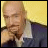 A four- shows a person in a dark blue jacket and white shirt against a yellow background, with text changing