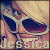 Pixelated static icon featuring a stylized purple and blue shoe with white accents against a beige background, with the name "Jessica" in light-colored text at the bottom.