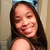 A static pixelated image of a person with long dark hair, light skin tone, and visible facial features including eyes, nose, mouth, and cheeks.
