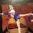 A pixelated image of a person in cheerleading attire performing a split on a red background with blue text reading "Cheer-Leading Is My Life! DEAL WITH IT!!".
