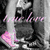 Black-and-white photo of two people embracing with pink text "I love you" overlaid, transitioning to a heart shape formed by hands holding a glowing yellow-orange object against dark background.
