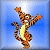 Pixelated orange and black striped tiger with yellow underbelly stands upright against blue gradient background, arms raised, tail curled, mouth open showing white teeth.
