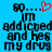 Blue background with black pixelated text reading "BO... I'm addicted and hes my drug" featuring a red heart symbol above the 'O' in BO.