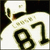 Pixelated image of a football player in white uniform with number 87 and helmet, next to text "TO THE STANLEY CUM" on black-and-white background.
