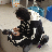 A pixelated image shows a person in dark clothing holding another figure, with text reading "I want Gee's PJs" on the right side.