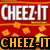 Animated icon with four distinct text sections: 'CHEEZ-IT' in white, 'THEY ARE' in green, 'CHEEZ-IT' in yellow, and 'BAM!' in red with 'BAM!' in yellow above it.