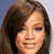 Pixelated close-up of a person with long brown hair, light skin tone, and neutral expression against gradient background.