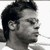Static grayscale buddy icon showing a side profile of a person with short dark hair and visible facial features including an ear, nose, mouth, and chin against a white background.