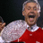 Pixelated image of a person in red and white clothing with mouth open, next to solid red background displaying 'OHIOSTATE' text.