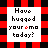 A 48x48 pixel animated buddy icon featuring a red and black checkered border with three white panels displaying the text "Have hugged your emo today?" in pixelated font, where the 'o' in 'emo' alternates between red and orange across frames.