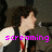 A pixelated image of a person with dark curly hair wearing a dark jacket and red tie, with pink text reading "screaming for him" overlaid across four