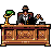 Pixel art of a man in a suit and hat standing behind a wooden desk with a green-shaded lamp, holding a small object.