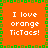 Orange background with green pixelated border and repeated white text "I love orange TicTacs!" in four quadrants.