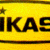 Yellow volleyball with black text and lines, showing multiple views of the Mikasa brand name on its surface.