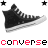 Pixelated black high-top sneakers with white laces and soles, two stars above each shoe, red-and-black text below.