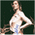 A pixelated image of a woman in a white dress with blue accents, standing against a dark background, next to green text reading "Original Icons .com".