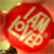 Static circular icon with red background and light-colored Chinese characters in a stylized font, appearing as a traditional decorative seal or stamp design.