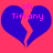 Two identical blue broken hearts on a pink background with pink text reading 'oh Tiffany' above each heart.
