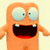 Pixelated orange cartoon character with large blue eyes and open mouth showing teeth, next to text elements on white background.