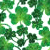 Green four-leaf clovers with varying shades of green and white background, pixelated rendering.