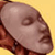A pixelated close-up of a person's face with closed eyes, resting on brown fabric against a yellow background.