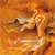 A pixelated image of a light-colored animal with dark patches, positioned against a warm-toned orange-brown background.