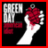 A 2x2 contact sheet of four distinct Green Day-themed animated frames featuring bold red and black color schemes with text, a raised fist holding a grenade, and a person at a podium.