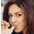 Two side-by-side animated frames of a woman with long brown hair in a 48x48 pixel buddy icon format, showing subtle facial expression changes between the left and right frame.