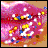 Pixelated image of a figure with pink hair, yellow eyes, and blue accents against a gradient background.