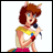 Pixelated anime character with brown hair and blue eyes holding a microphone, wearing a yellow and white top with pink pants against a white background.