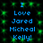 Blue pixelated text on a black background with green sparkles, repeating 'I Love Jared Micheal Kelly!' twice in vertical