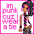 Pixel art character with dark hair and blue eyes wearing a pink-and-black striped shirt, patterned shorts, wristbands, and a tie; text reads "im punk cuz i wear a tie" in pink letters.