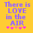 Yellow background with purple text reading 'There is LOVE in the AIR' and five pink asterisks below, where the third asterisk is lighter pink.