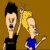 Pixelated cartoon image of two characters against a solid brown background, one with black hair in a black shirt and the other with blonde hair in a blue shirt holding an object.