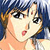 Pixelated cartoon-style image of a character with light skin, brown hair, and large black eyes, mouth open in a surprised expression against a blue background.